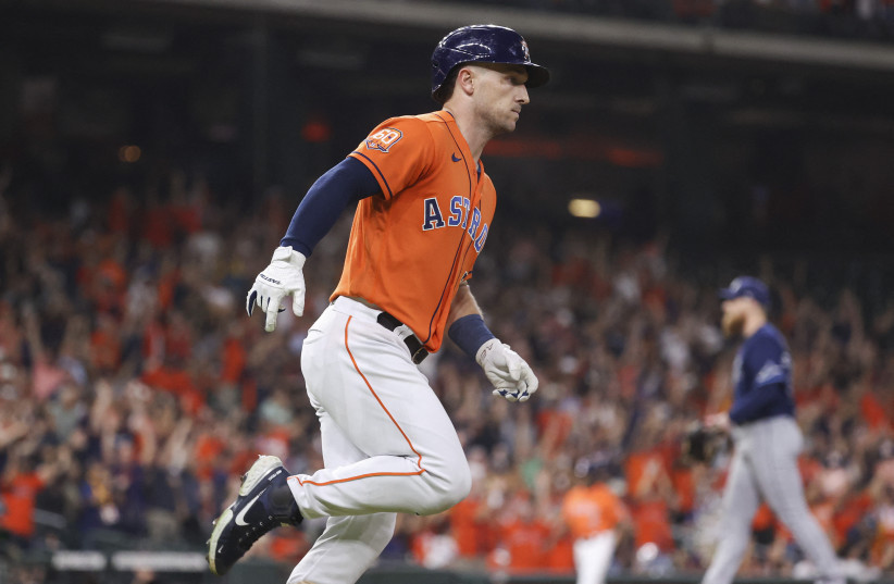  Tampa Bay Rays starting pitcher Drew Rasmussen (57) reacts and Houston Astros third baseman Alex Bregman (2) runs to first base after hitting a home run during the first inning at Minute Maid Park, September 30, 2022. (photo credit: TROY TAORMINA-USA TODAY SPORTS)