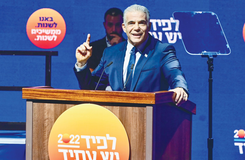  PRIME MINISTER Yair Lapid speaks during an election campaign event in Tel Aviv last month (photo credit: AVSHALOM SASSONI/FLASH90)