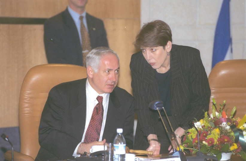  BENJAMIN NETANYAHU at a cabinet meeting with Limor Livnat in 1999.  (credit: AMOS BEN-GERSHOM/GPO)