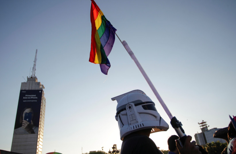  A participant wearing a Storm Trooper helmet takes part in the LGBT pride parade in Monterrey, Mexico, June 26, 2021. (photo credit: DANIEL BECERRIL/REUTERS)