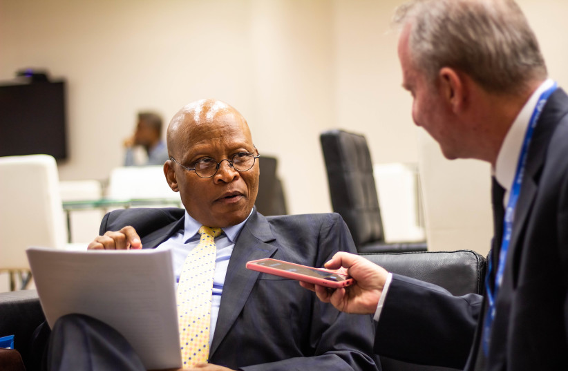  Former South African Chief Justice Mogoeng Mogoeng talks to Steve Linde at the Payis Arena on Tuesday. (credit: LIAM FORBERG)