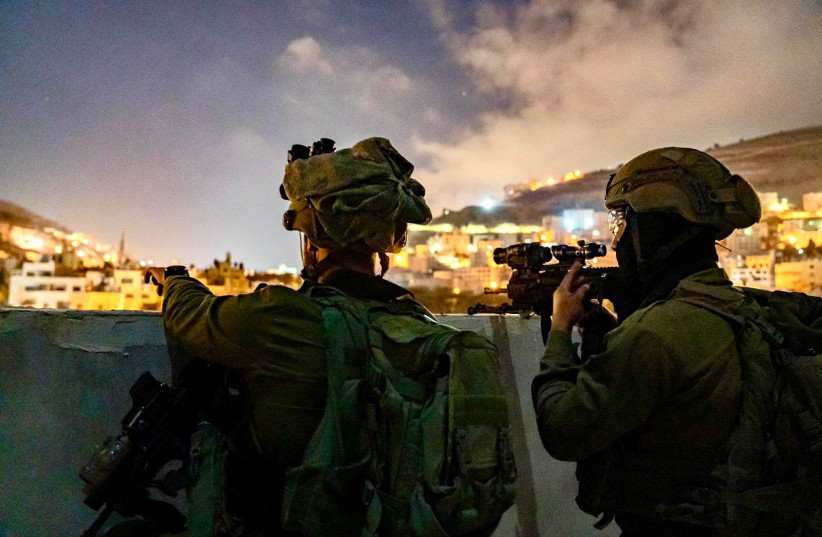 IDF soldiers securing the entry of worshipers to Joseph's Tomb October 13, 2022. (photo credit: IDF SPOKESPERSON UNIT)
