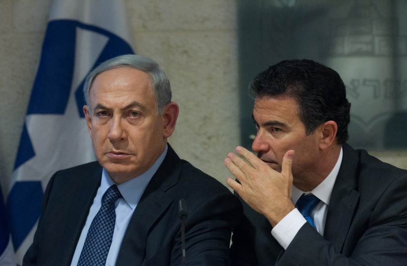  Former prime minister Benjamin Netanyahu seen with then-Mossad director Yossi Cohen at the Foreign Ministry in Jerusalem, Israel on October 15, 2015 (photo credit: MIRIAM ALSTER/FLASH90)