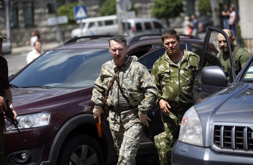  Pro-Russian separatist commander Igor Strelkov arrives to attend a marriage ceremony in the registry office of the city of Donetsk (photo credit: REUTERS)