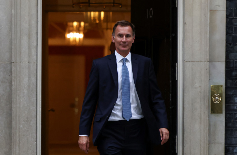  New Chancellor of the Exchequer Jeremy Hunt leaves 10 Downing Street in London, Britain, October 14, 2022.  (credit: REUTERS/HENRY NICHOLLS)