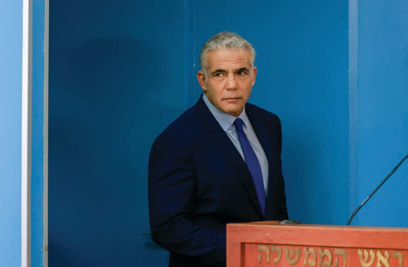  SHORTLY AFTER Yair Lapid became caretaker prime minister, Hezbollah sent UAVs toward Israel’s gas platforms, threatening to attack production weeks before the election. Suddenly, Lapid agreed to accept a deal, says the writer.  (photo credit: OLIVIER FITOUSSI/FLASH90)