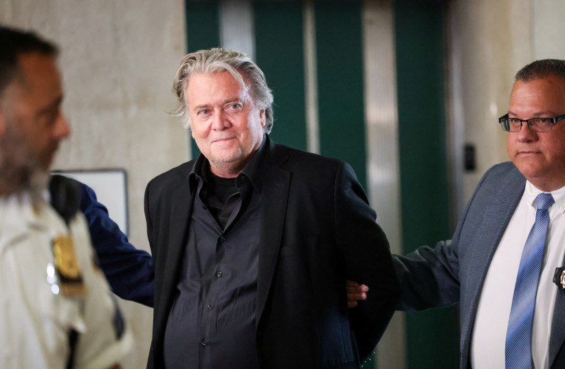  Former US president Donald Trump's White House chief strategist Steve Bannon is escorted into courtroom for arraignment, in New York, US, September 8, 2022.  (credit: REUTERS/CAITLIN OCHS)