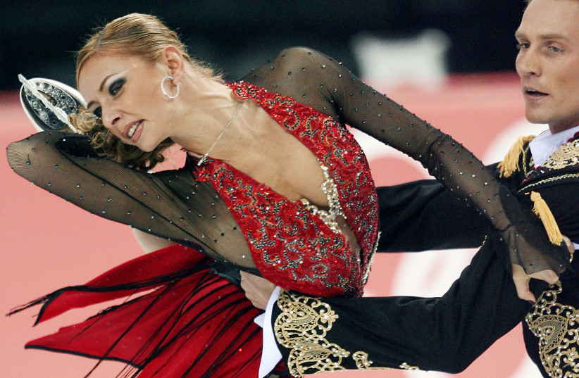 Tatiana Navka during her ice skating days with partner Roman Kostomarov in the Ice Dancing Free Dance event during the Figure Skating competition at the 2006 Winter Olympics, 20 February 2006 in Turin.  (credit: YURI KADOBNOV/AFP via Getty Images)