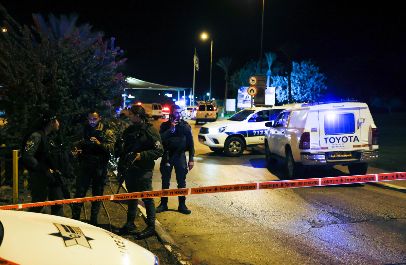 Police and rescue personnel at the scene of a terror attack at the entrance to the Jewish settlement of Ma’aleh Adumim, outside of Jerusalem, October 19, 2022. (credit: OLIVIER FITOUSSI/FLASH90)