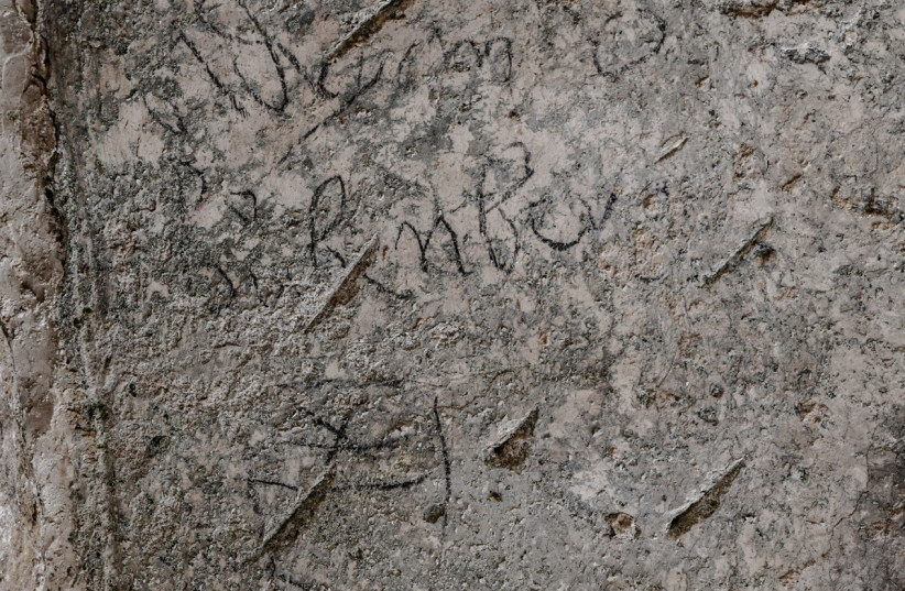  An inscription bearing the name of Swiss noble Adrian von Bubenberg, discovered in King David's Tomb in Jerusalem   (photo credit: SHAI HALEVI / ISRAEL ANTIQUITIES AUTHORITY)