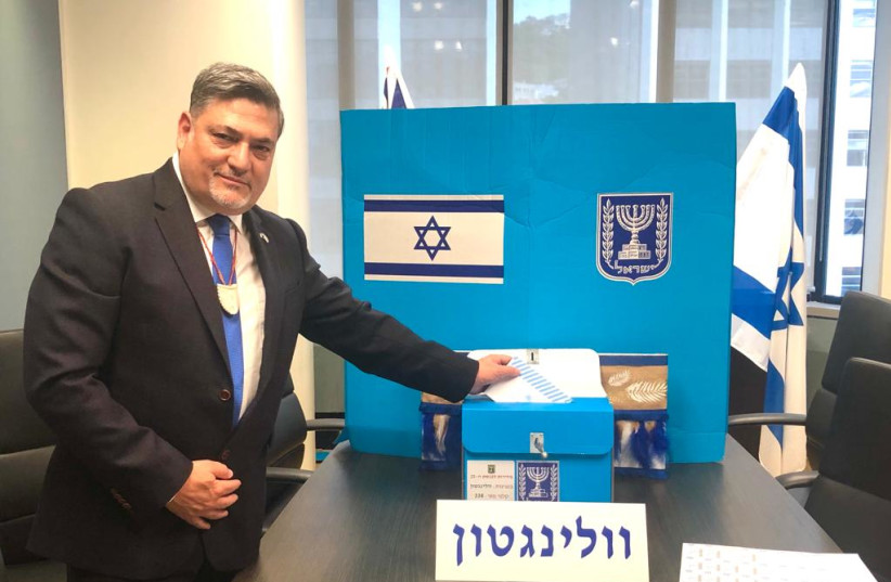 Ambassador to New Zealand Ran Yaakoby opens voting in the Knesset election (photo credit: ISRAELI EMBASSY IN NEW ZEALAND)