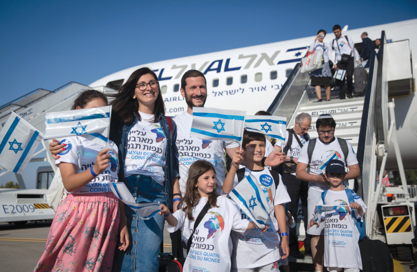  IMMIGRATING TO Israel is the first step in a very long journey. (Pictured: Recent French olim). (photo credit: MIRIAM ALSTER/FLASH90)