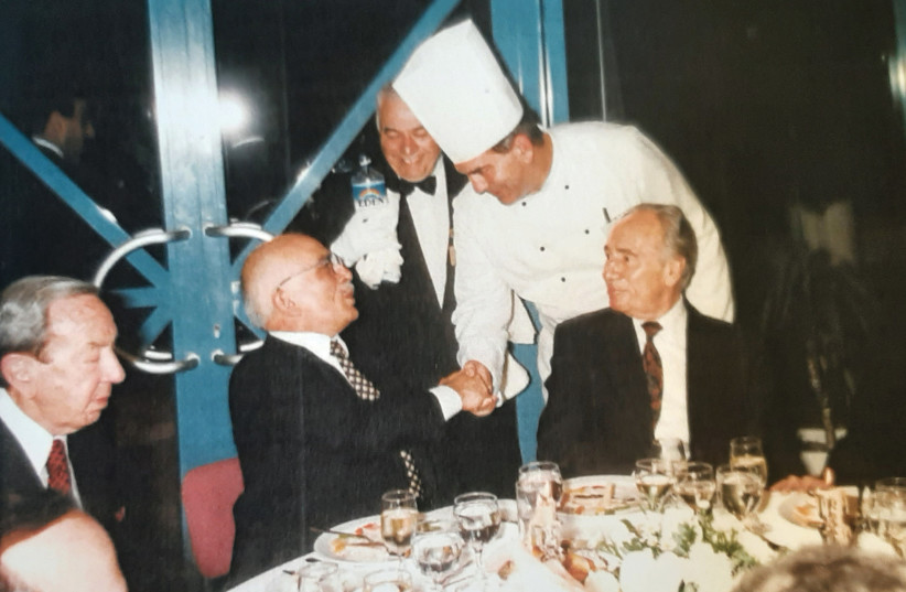  GREETING KING HUSSEIN of Jordan as prime minister Shimon Peres looks on. (credit: Shalom Kadosh)