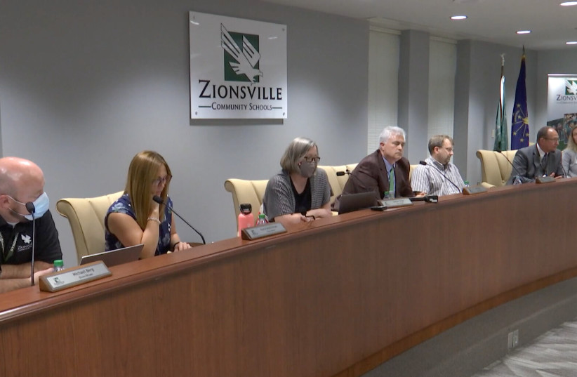  Members of the Zionsville, Indiana, school board shown at a recent meeting. (photo credit: Screenshot from WTHR)