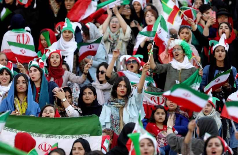  Iranian women attend Iran's World Cup Asian qualifier against Cambodia at the Azadi stadium in Tehran, Iran October 10, 2019 (photo credit: WANA (WEST ASIA NEWS AGENCY) VIA REUTERS)