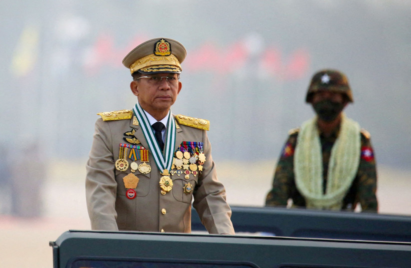  Myanmar's junta chief Senior General Min Aung Hlaing, who ousted the elected government in a coup on February 1, 2021, presides over an army parade on Armed Forces Day in Naypyitaw, Myanmar, March 27, 2021. (photo credit: REUTERS/STRINGER/FILES)