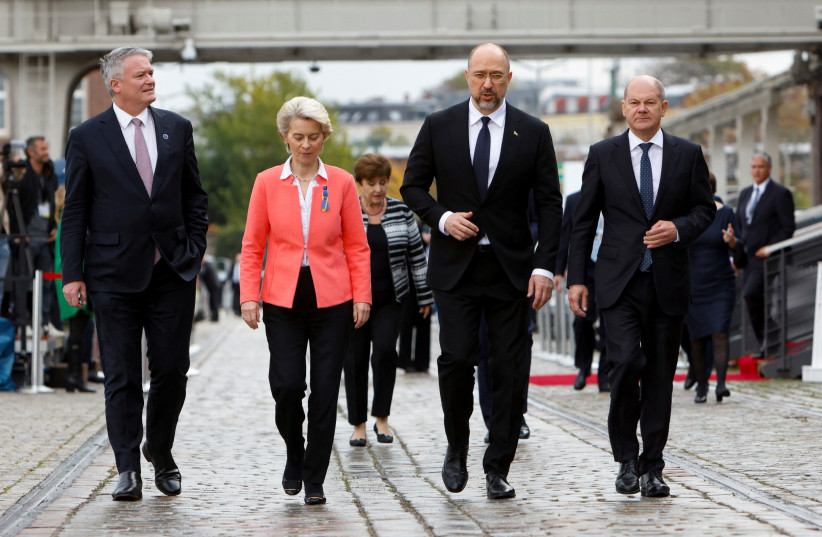  Secretary-General of the Organisation for Economic Co-operation and Development (OECD) Mathias Cormann, EU Commission President Ursula von der Leyen, Ukrainian Prime Minister Denys Shmyhal, and German Chancellor Olaf Scholz walk on the day of a conference on post-war reconstruction of Ukraine. (credit: REUTERS/MICHELE TANTUSSI)