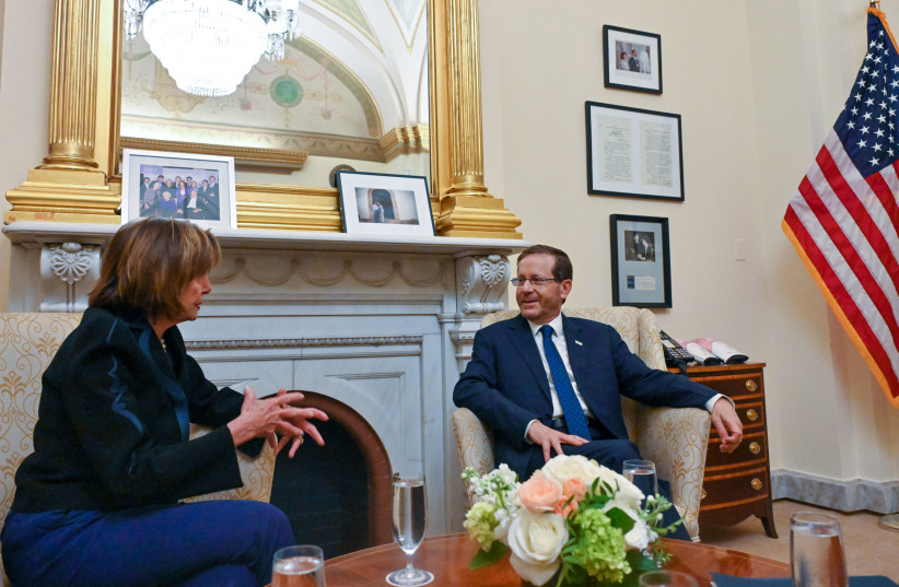  Nancy Pelosi, speaker of the US House of Reps. with Israeli President Isaac Herzog on October 25, 2022 (photo credit: KOBI GIDEON/GPO)