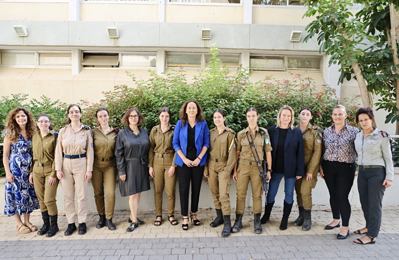   Ayala Miller (5th from left) and Karin Rubinstein yaakov(7th from left) with participants of the newly-launched program's pilot. (credit: ALON GILBOA)