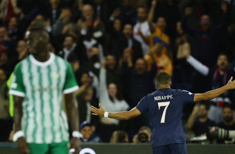  Paris St Germain's Lionel Messi celebrates scoring their first goal. (credit: REUTERS/SARAH MEYSSONNIER)