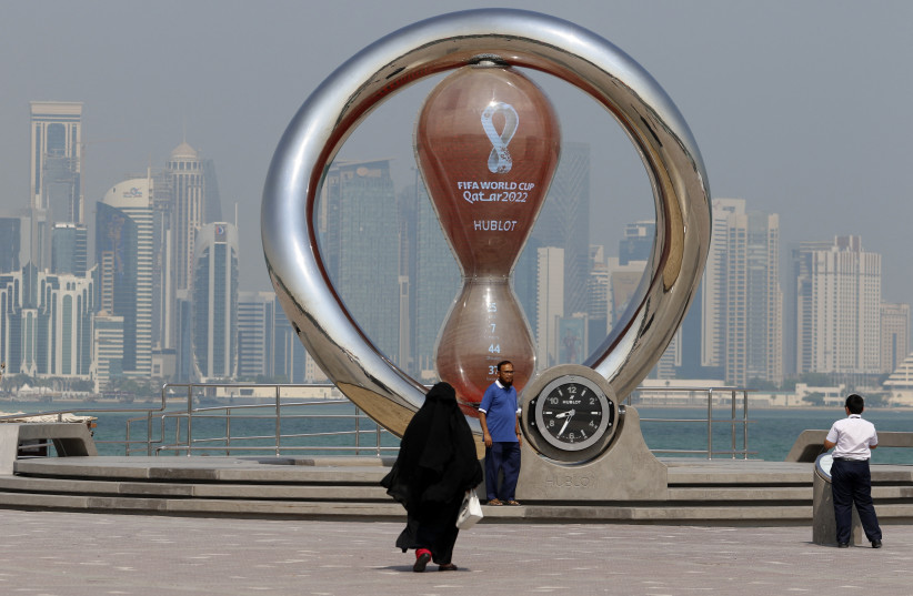  General view as people pose for a picture ahead of the World Cup in Qatar. (photo credit: REUTERS/HAMAD I MOHAMMED)