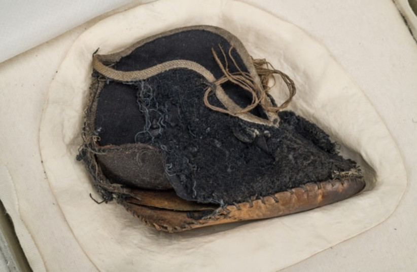  A child’s shoe at the Auschwitz Museum  (photo credit: MARCH OF THE LIVING)
