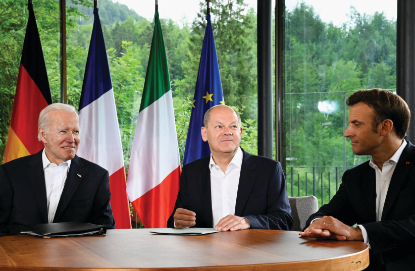  US PRESIDENT Joe Biden, Germany’s Chancellor Olaf Scholz and France’s President Emmanuel Macron meet on the sidelines of the G7 summit in Germany, in June. The writer recommends that a peace summit be called by one of these leaders or some combination of the three. (credit: Tobias Schwarz/Reuters)