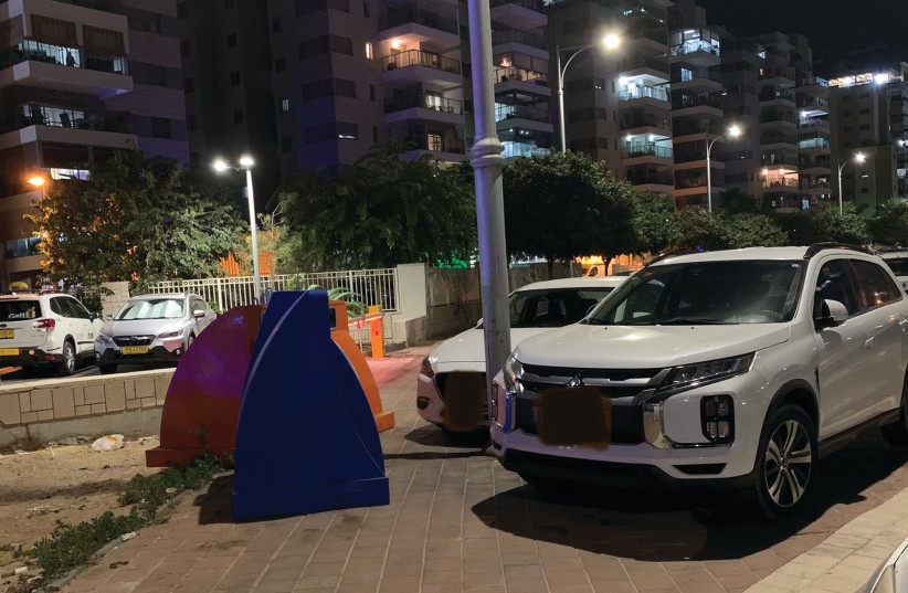 A TYPICAL evening as cars completely block sidewalk access, in Ashkelon, earlier this month. (photo credit: David Levine)