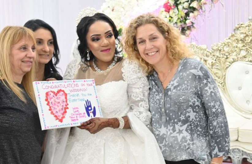The Save a Child's Heart team attends the wedding of a woman in Zanzibar who they saved 15 years ago  (photo credit: SAVE A CHILD'S HEART)