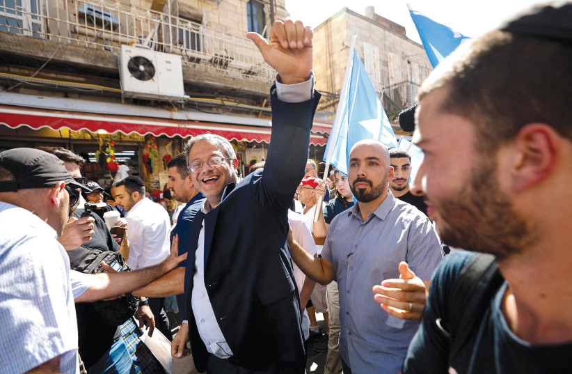  MK Itamar Ben-Gvir (Religious Zionist Party) tours Mahaneh Yehuda market in the run-up to Israel’s elections. (credit: AMIR COHEN/REUTERS)