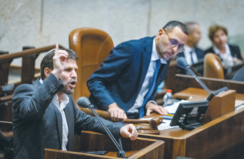 MK BEZALEL Smotrich addresses the Knesset plenum. The unusual state of Israeli politics has highlighted the attraction of its extremities, says the writer (photo credit: OLIVIER FITOUSSI/FLASH90)