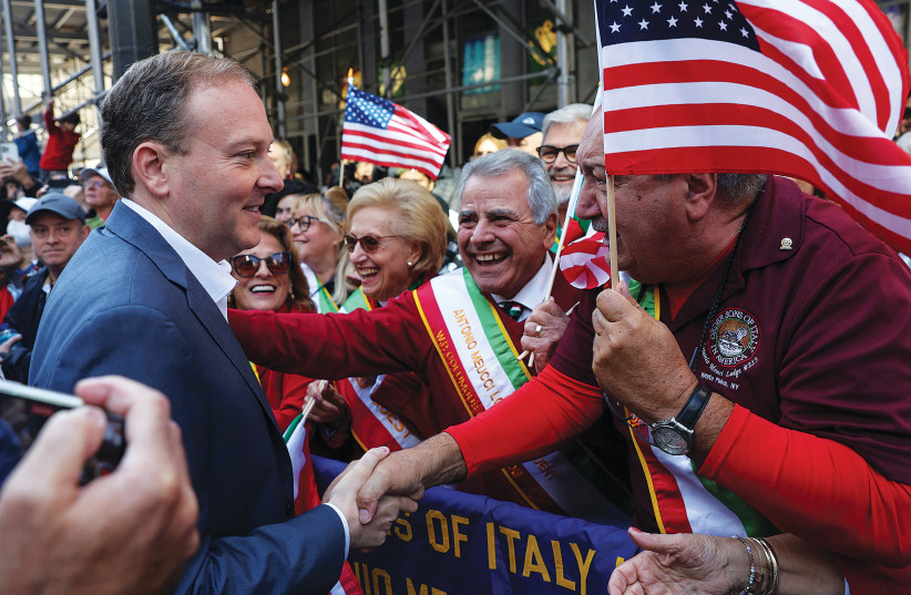  NEW YORK Congressman and Republican New York gubernatorial candidate Lee Zeldin shakes hands with people during the annual Columbus Day parade in New York City, earlier this month (photo credit: REUTERS/SHANNON STAPLETON)
