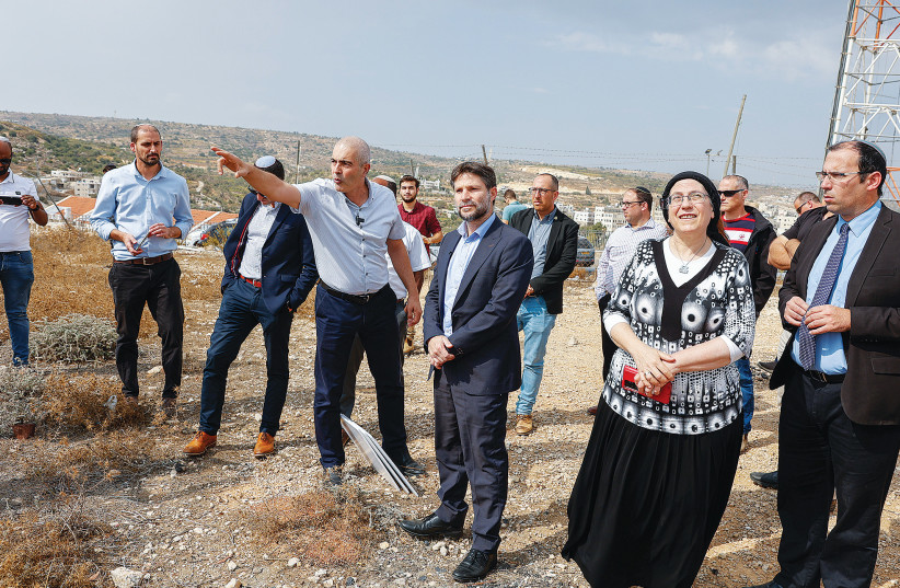  RELIGIOUS ZIONIST Party leader Bezalel Smotrich and party members on a visit to Efrat this week (photo credit: GERSHON ELINSON/FLASH90)