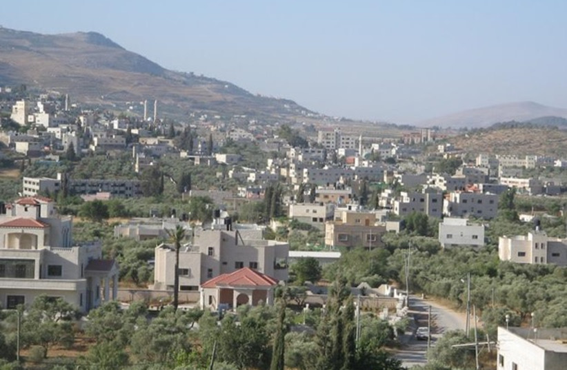 Huwara, West Bank (photo credit: ANAN ODEH/CC BY-SA 3.0 (https://creativecommons.org/licenses/by-sa/3.0)/VIA WIKIMEDIA COMMONS)
