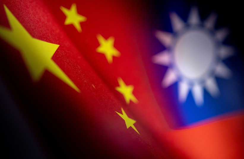  Illustration shows Chinese and Taiwanese flags (photo credit: REUTERS)