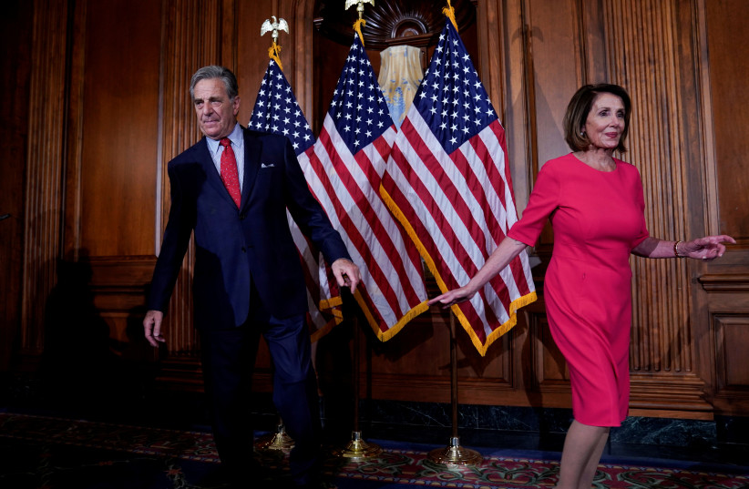 Speaker of the House Nancy Pelosi (D-CA) walks away from her husband Paul Pelosi on Capitol Hill in Washington, US, January 3, 2019. (credit: REUTERS/JOSHUA ROBERTS)