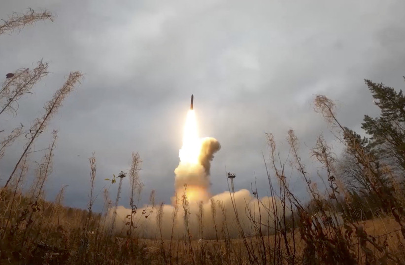  A still image from video, released by the Russian Defence Ministry, shows what it said to be Russia's Yars intercontinental ballistic missile launched during exercises held by the country's strategic nuclear forces at the Plesetsk Cosmodrome, Russia, October 26, 2022. (photo credit: RUSSIAN DEFENSE MINISTRY/HANDOUT VIA REUTERS)