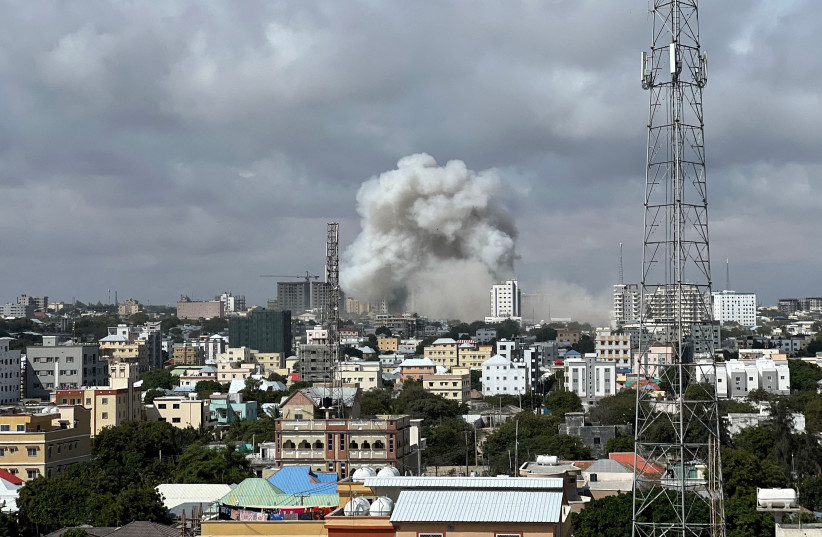  A view shows smoke rising following a car bomb explosion at Somalia's education ministry in Mogadishu, Somalia October 29, 2022 in this picture obtained from social media (photo credit: REUTERS)