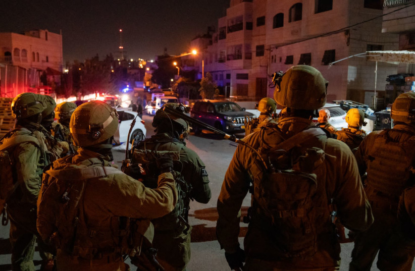  IDF troops operate at the scene of a terror attack in Kiryat Arba, October 29, 2022. (photo credit: IDF SPOKESPERSON'S UNIT)