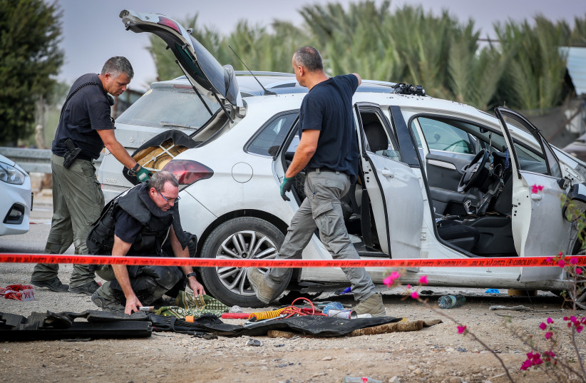  Israeli security forces guard at the scene of a vehicle-ramming attack in the Almog Junction, in the West Bank, October 30, 2022. (credit: JAMAL AWAD/FLASH90)