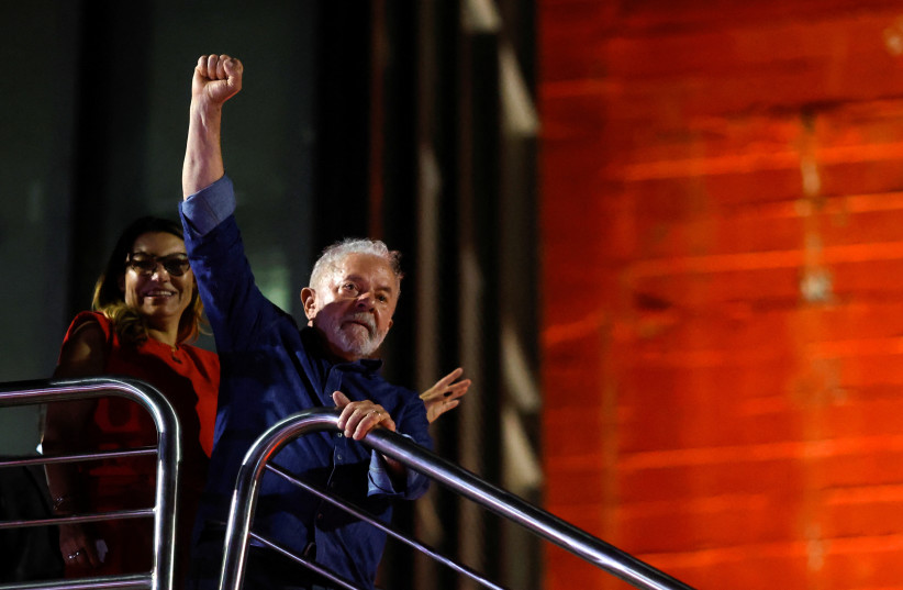 Brazil's former President and presidential candidate Luiz Inacio Lula da Silva and his wife Rosangela Lula da Silva, also know as Janja, react at an election night gathering on the day of the Brazilian presidential election run-off, in Sao Paulo, Brazil, October 30, 2022.  (photo credit: REUTERS/AMANDA PEROBELLI)