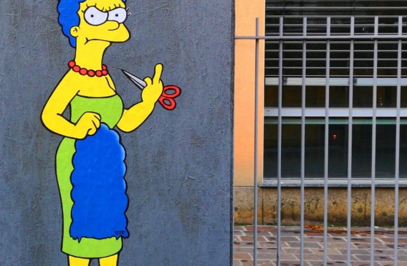  A mural of Marge Simpson cutting her hair. (photo credit: ALEXSANDRO PALOMBO)