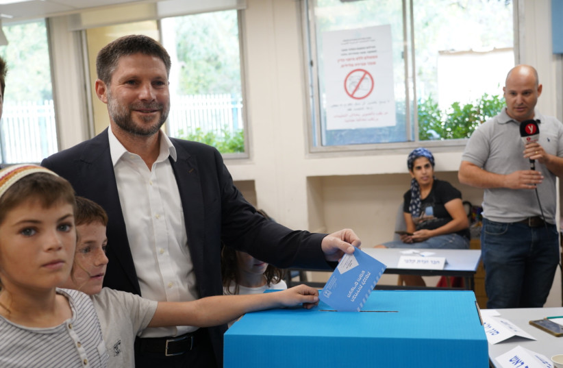  Religious Zionist Party leader MK Bezalel Smotrich arrive to cast his vote in the Israeli general Elections on November 1, 2022.  (credit: HILLEL MAEIR/FLASH90)