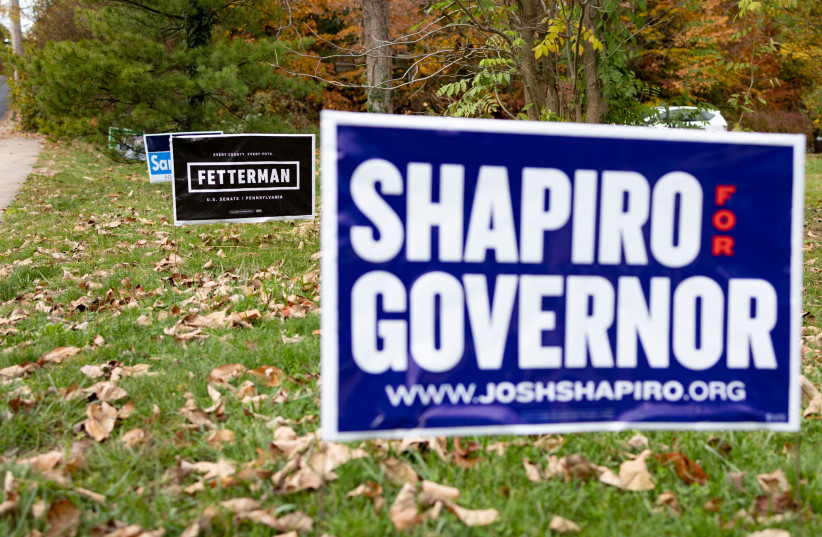  Signage for Democratic candidate for Governor Pennsylvania Attorney General Josh Shapiro and Lieutenant Governor and US Senate candidate John Fetterman is pictured in Doylestown, Pennsylvania, US, October 31, 2022. (photo credit: Hannah Beier/Reuters)