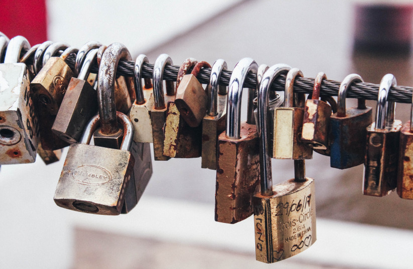  PROMISES: LOCKED in, though not immediate. (photo credit: Marcos Mayer/Unsplash)