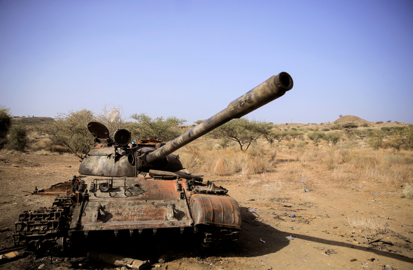   A destroyed tank is seen in a field in the aftermath of fighting between the Ethiopian National Defence Force (ENDF) and the Tigray People's Liberation Front (TPLF) forces in Kasagita town, in Afar region, Ethiopia (credit: REUTERS)
