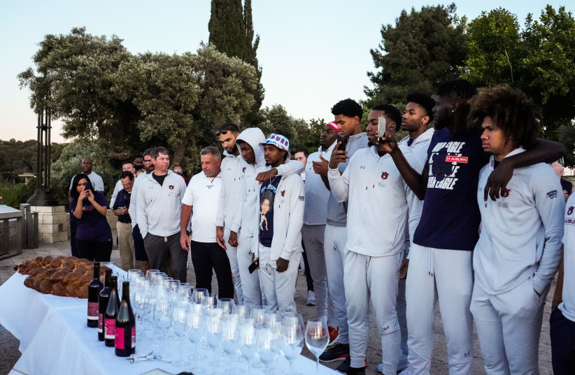  The Auburn University men's basketball team celebrating Shabbat in Israel, July 31, 2022. (photo credit: AUBURN ATHLETICS)