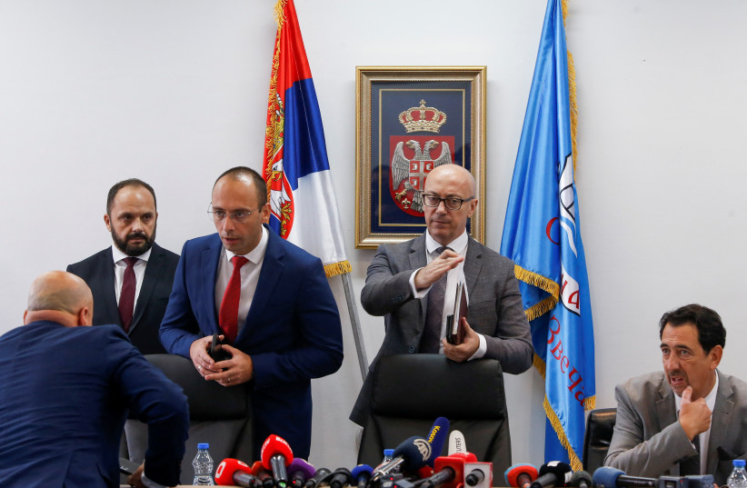  Kosovo's Minister of Communities and Returns Goran Rakic and Igor Simic, a member of parliament of Kosovo, stand following local Serbs' decision to leave Kosovo institutions, in Zvecan, Kosovo, November 5, 2022. (photo credit: OGNEN TEOFILOVSKI/REUTERS)