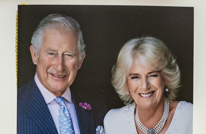  The front of one of the first birthday cards celebrating 100 years of age, signed by Britain’s King Charles and Queen Consort Camilla, is seen at Buckingham Palace on October 23. (credit: AARON CHOWN/POOL/REUTERS)