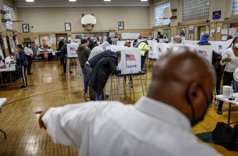  Michigan voters cast their ballots at Louis Pasteur Elementary School on midterm election day in Detroit, Michigan, November 8, 2022 (photo credit: REUTERS/EVELYN HOCKSTEIN)